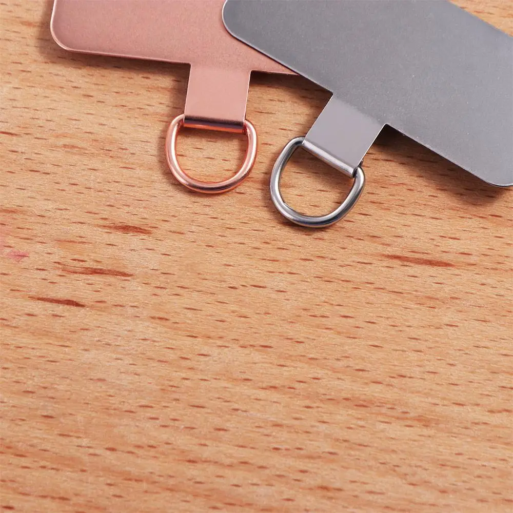 

Металлическая пластина-крепление для телефона из нержавеющей стали с отстегивающимся ремешком-шнурком, предотвращающая потерю, для мобильных телефонов