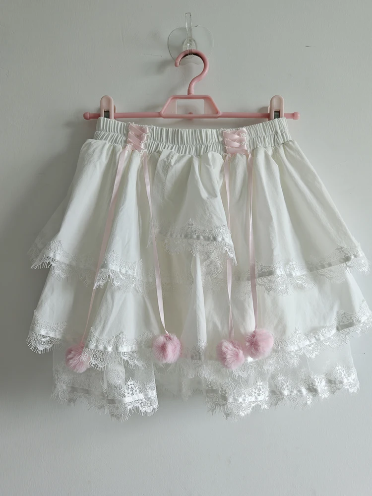 Mini jupes mignonnes pour filles douces, garniture en dentelle, décoration de nœud, taille élastique, short de style Lolita, vêtements Kawaii, été