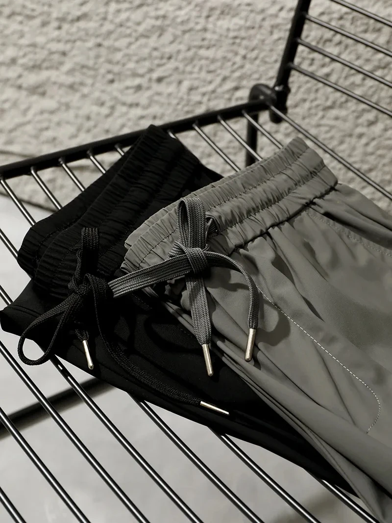 

Ледяной шелк, эластичное волокно, четырехмерные спортивные повседневные брюки с ощущением облаков, дышащие весенне-летние свободные брюки прямого кроя