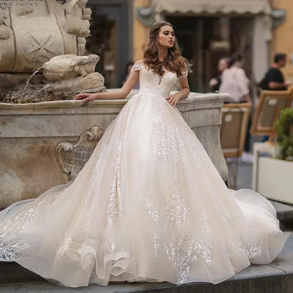

Customize Elegant A Line Wedding Dress Boat Neck Sleevelesss Lace Sexy Backless Bridal Gown Floor Length Marriage Dresses2025