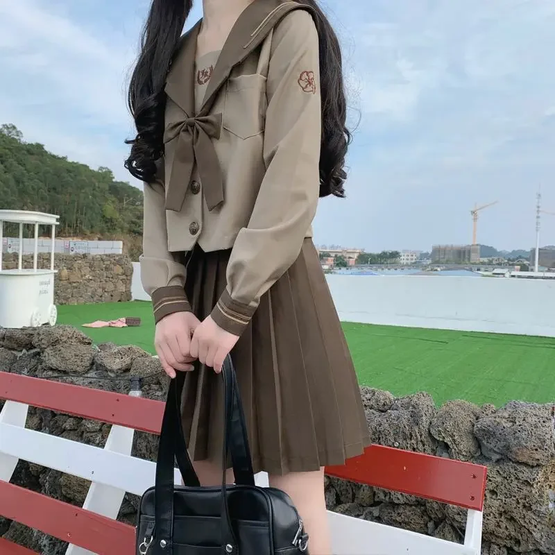 Uniforme da escola de moda japonesa menina macia jk uniforme estudante saia menina leite chá marrom marinha vento marinheiro terno plissado saia conjunto