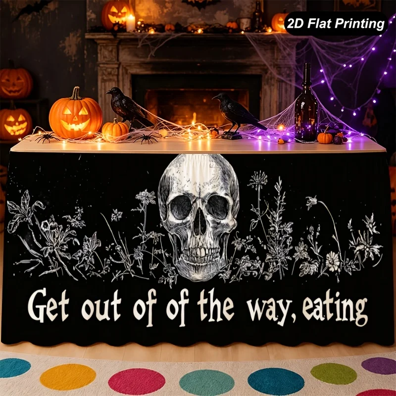 Halloween table skirt, with a black background and white lines depicting skulls and floral patterns in text form.