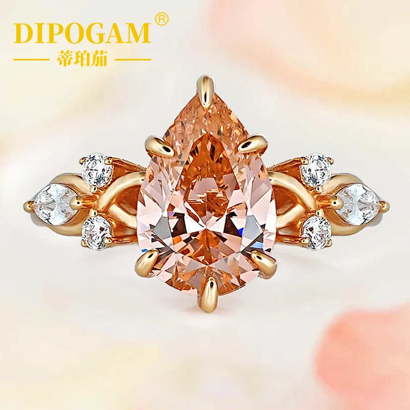 

Кольцо из серебра 925 пробы с выращенным бриллиантом 4 карата пастельно-оранжевого цвета, с покрытием из розового золота, в форме капли, нежное и изящное.