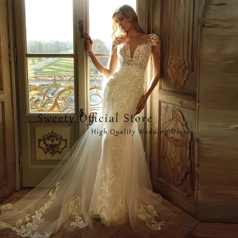 สง่างามเงือกชุดแต่งงานปักลูกไม้สุทธิกับO-คอShortsleeves BridedressเปลือยVestido De N Oviaที่กําหนดเอง