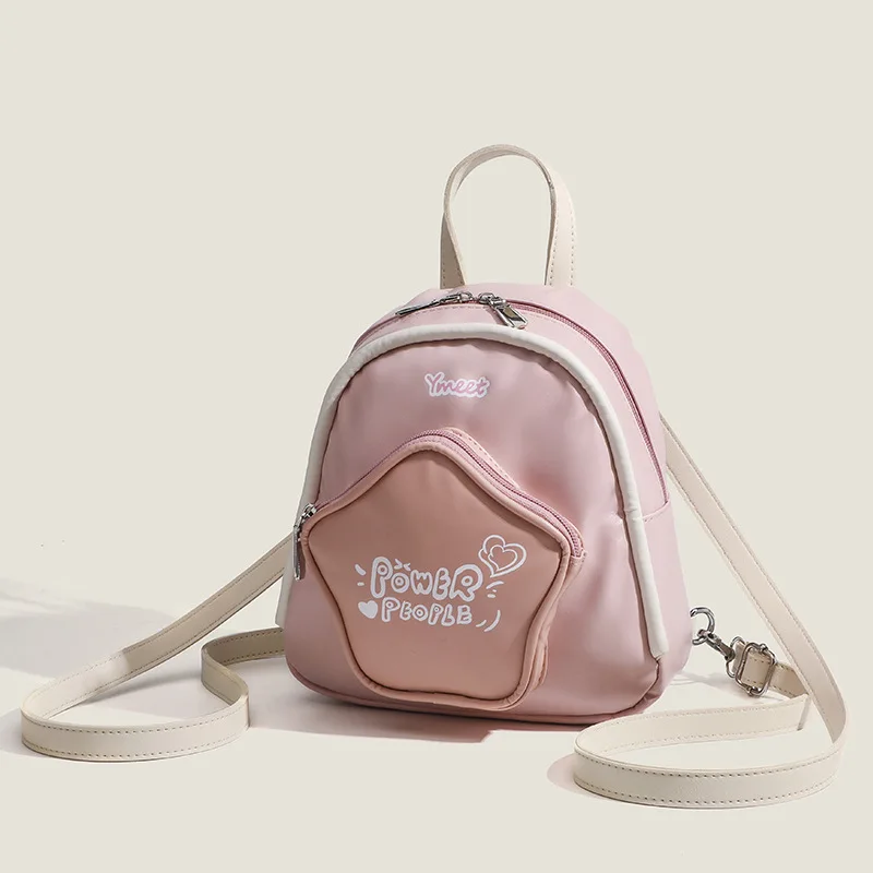 Tas ransel MINI ทรงห้าเหลี่ยมใหม่สำหรับฤดูใบไม้ร่วงปี2024กระเป๋าเป้สะพายหลังสวยงามและน่ารักขนาดเล็กกระเป๋านักเรียนเดินทางส่วนบุคคล