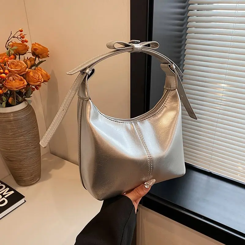 Bell 2024 New Style Silver Dumpling Underarm Small Crowd Design Commuting Fashion Sewing Thread All-match Small Crossbody Bag