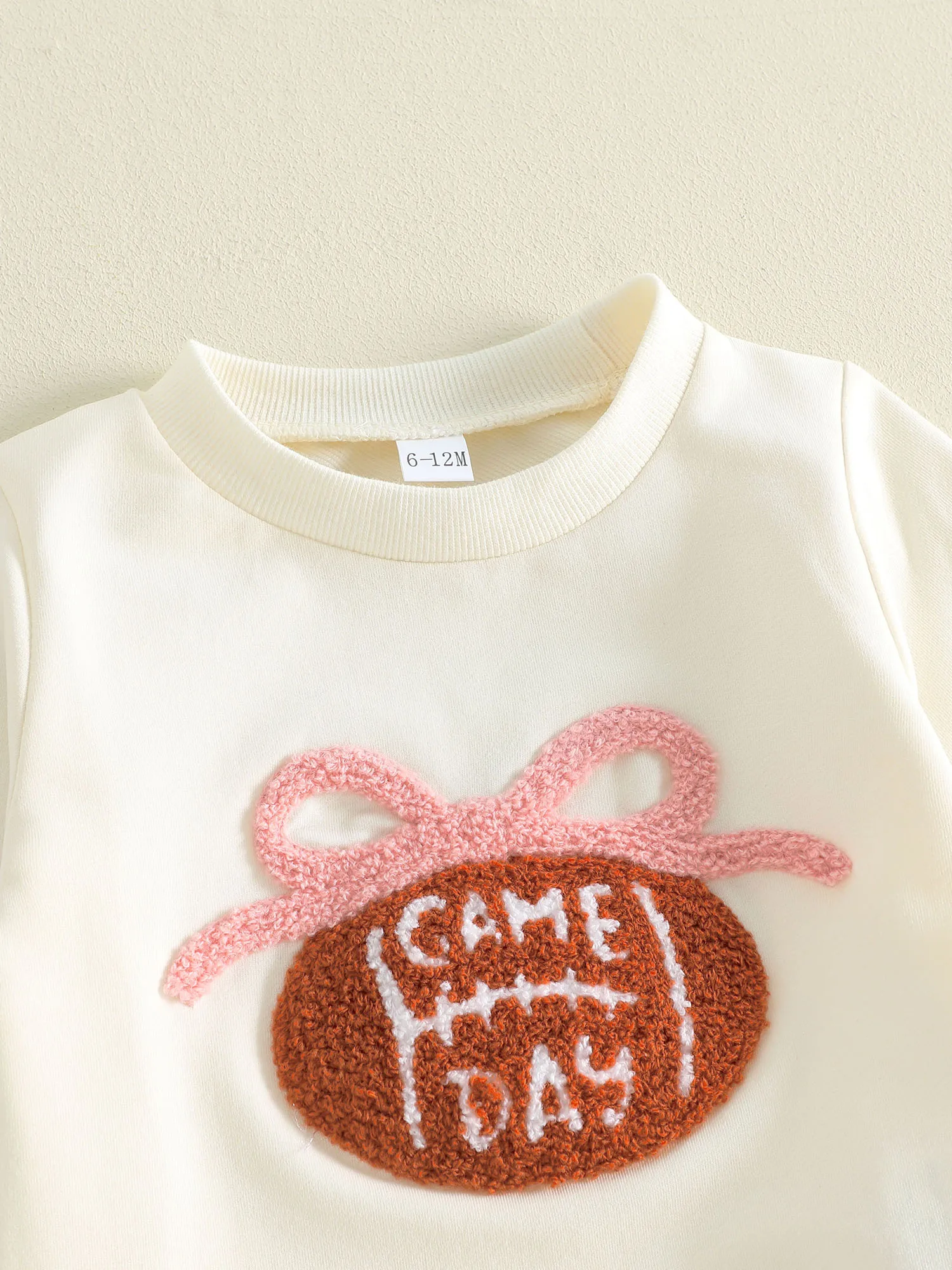 

Adorable Infant Girls Winter Ensemble Stylish Soccer Ball Bow Detail Sweater and Trousers 2-Piece Suit