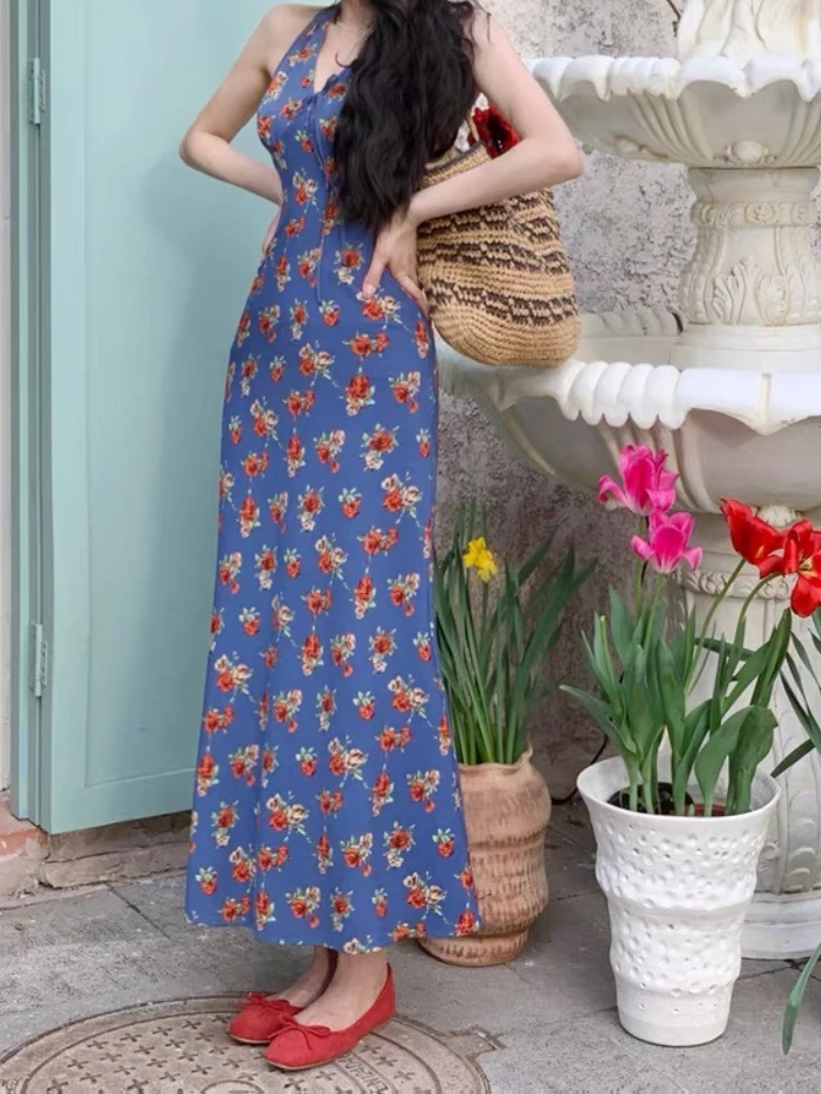 Abito floreale da donna con atmosfera di temperamento dimagrante con scollo a V blu in stile retrò Hong Kong