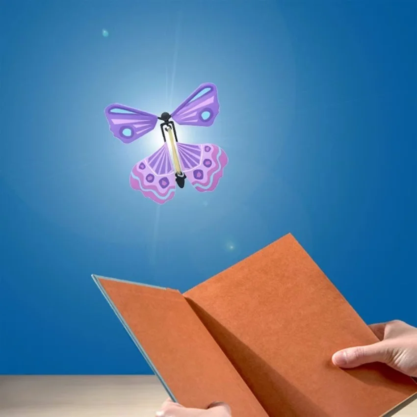 Magic Wind Up Flying Butterfly in the Book Rubber Band Powered Magic Fairy Flying Toy Great Surprise Gift Party Favor