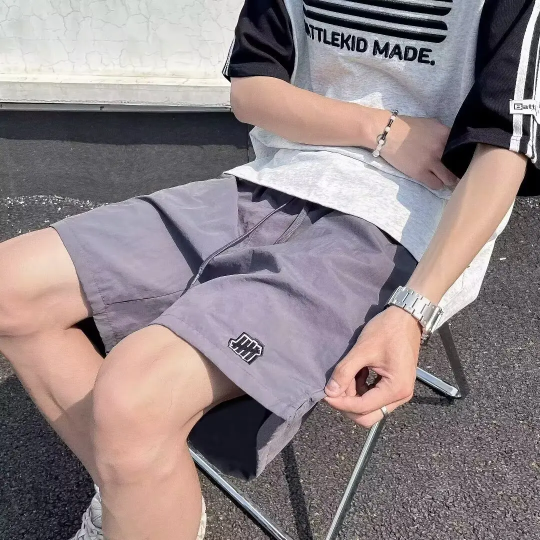 

Простая повседневная рабочая одежда, быстросохнущие шорты, мужские летние модные спортивные брюки для бега.