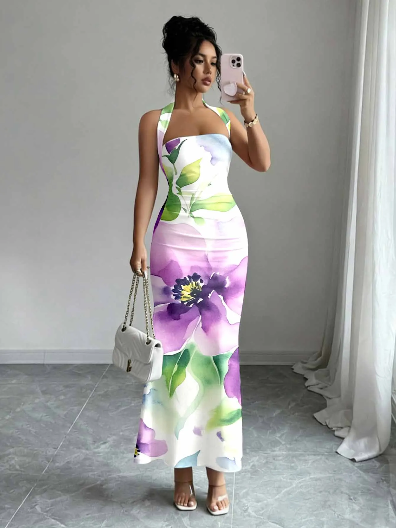 Tailored neck hanging long dress with exposed back design adding a refined look