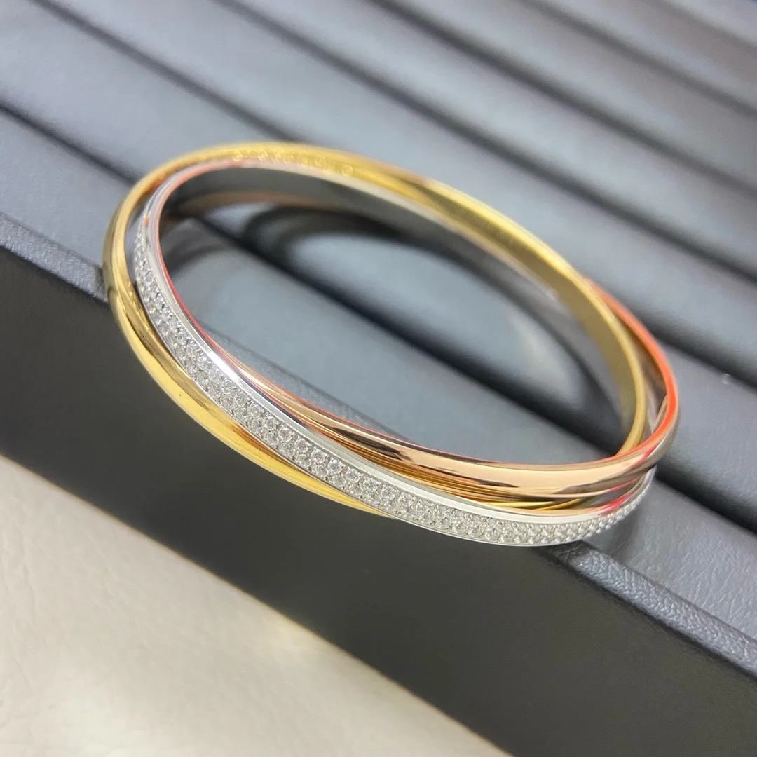 

Xiqi Jewelry New Classic Round Elegant Three-Color Triple-Ring Geometric Fashion Pattern Gold Bracelet with Diamonds for Women -