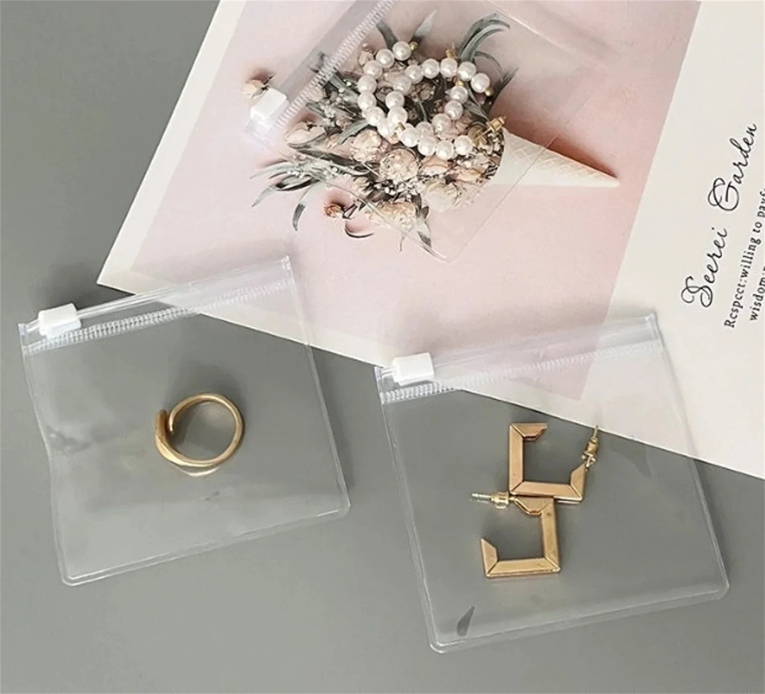 

100pcs custom logo jewelry bag, bracelet bag, necklace bag, ring bag, transparent packaging bag