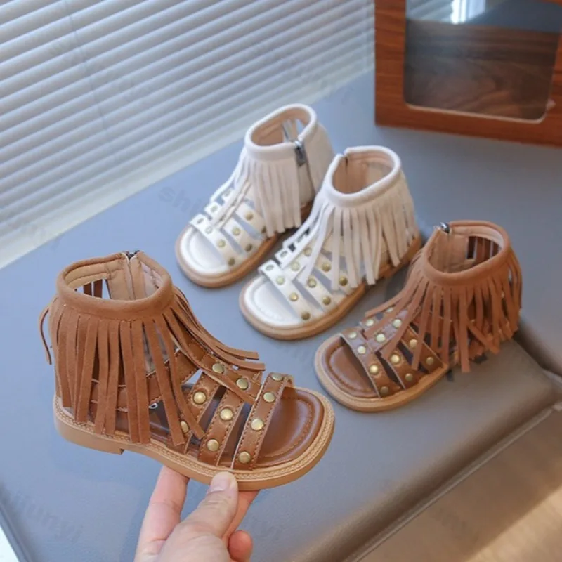 

Girls' Roman Retro Rivet Tassel Design Casual Flat Sandals 2025 Summer New Children's Soft Soled Comfortable Princess Cool Shoes