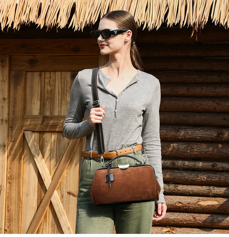 

Flip cow anti iron hinge ladies handbag collision color splicing doctor bag women's real leather travel high-grade crossbody bag