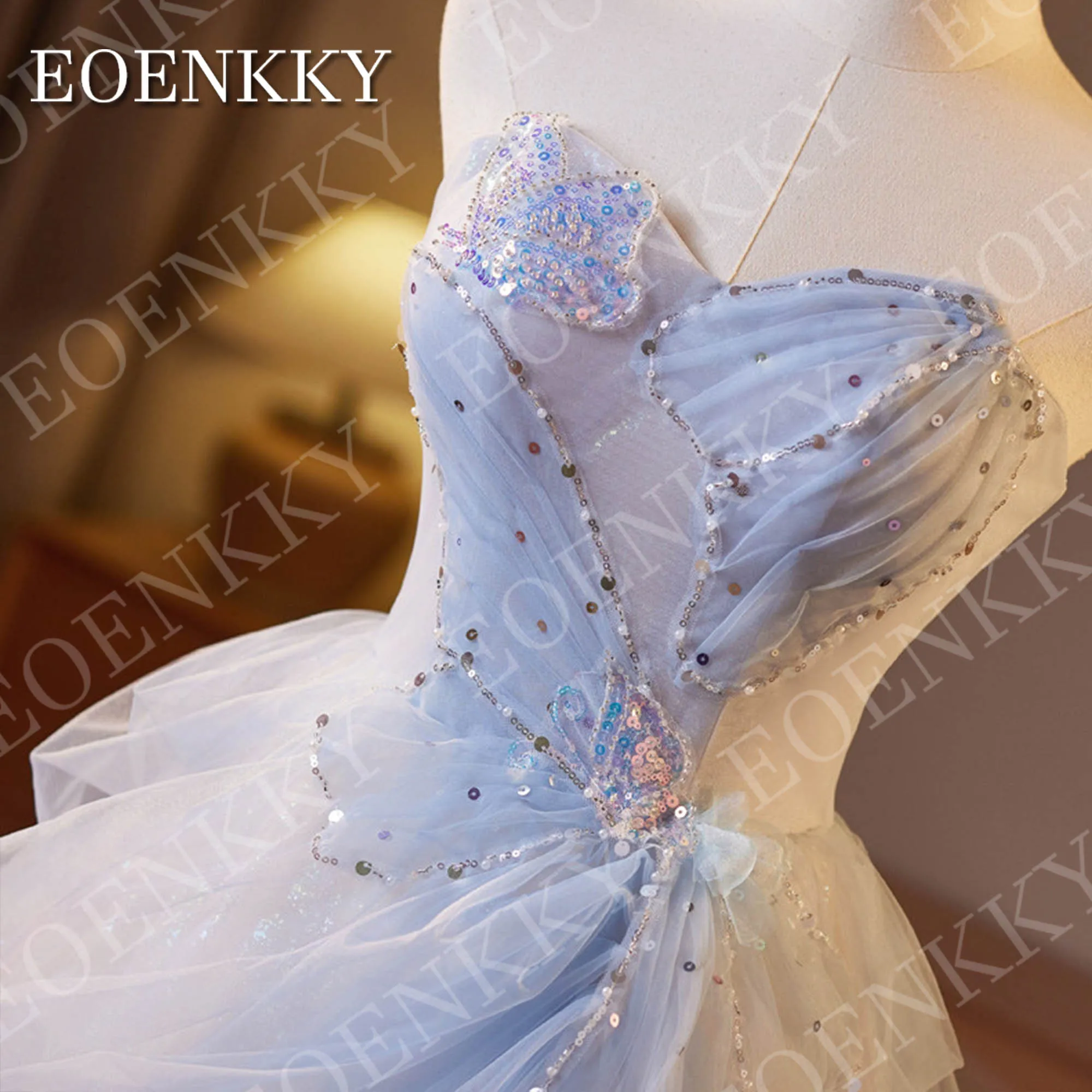 فستان EOENKKY فاخر باللون الأزرق الفاتح للحفلات الراقصة 2025 على شكل قلب ترتر خرز الأميرة اللامعة على شكل فراشة تول فساتين التخرج مخصصة فستان الرفيعة الزرقاء الفاخرة 2025 حبيبتي بائكة حبة الأميرة براقة فراشة تول فساتين
