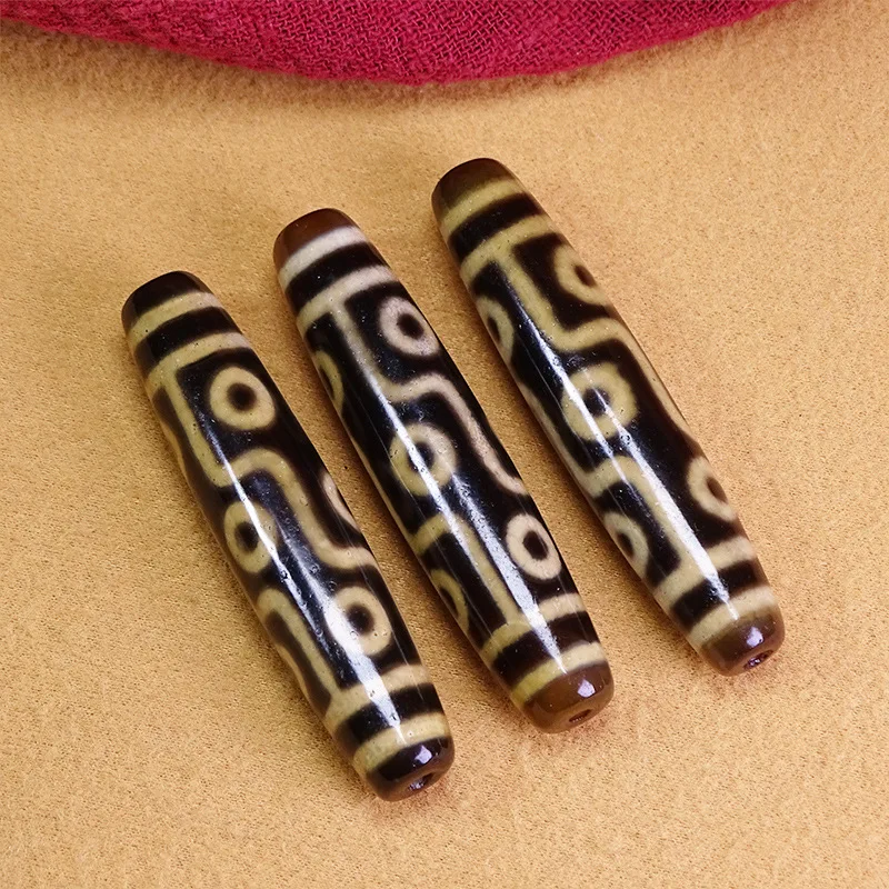 Tibetan natural authentic old mine raw stone nine-eyed dzi bead pendant collarbone necklace, approximately 13x58mm