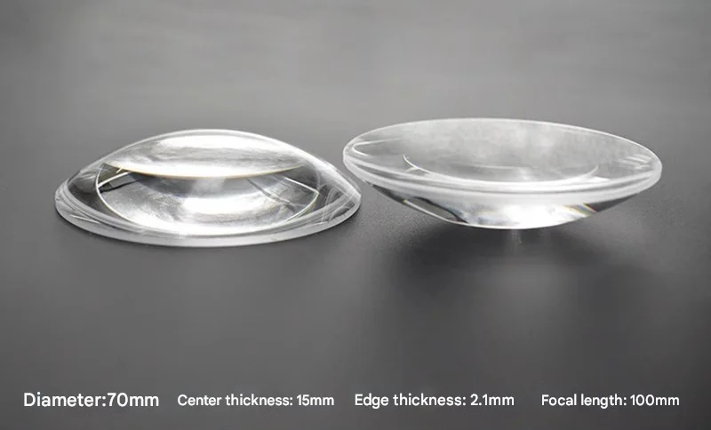 Плоско-выпуклая линза диаметром 70 мм и фокусное расстояние 100 мм. Обработка оптического стекла. Оптическая выпуклая линза.