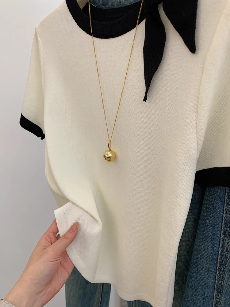 تي شيرت نسائي كبير الحجم مع عقدة من الحرير الجليدي المحبوك ort Sve الكورية Sle تصميم الصيف الإحساس العمر المخفض...