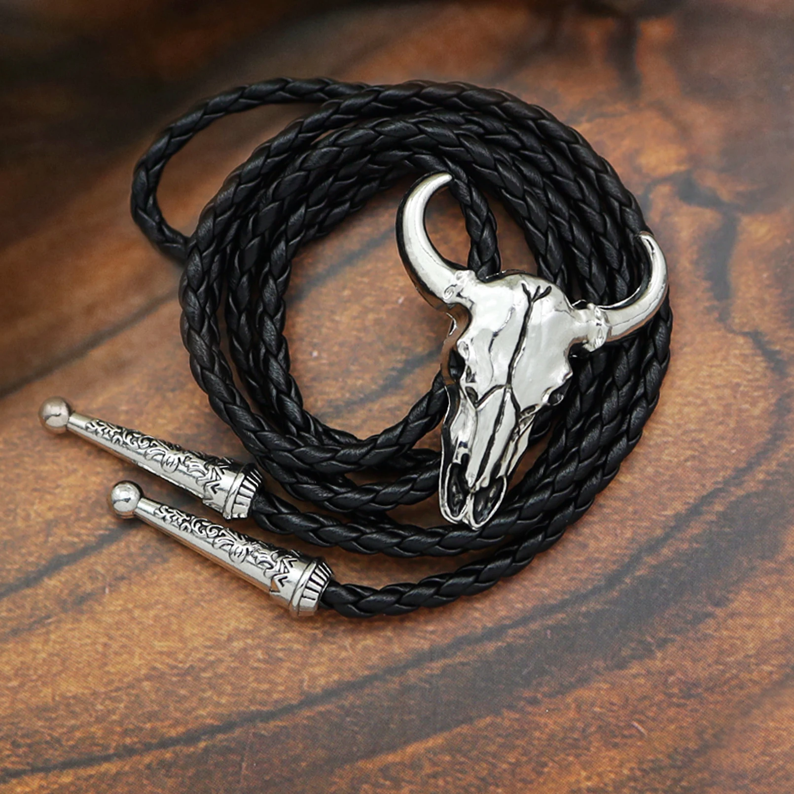 Western Vintage Bolo Tie for Men Cow Skull Design Cowboy Tie Black Leather Rope Necktie Bull Head Pendant Necklace Jewelry Gifts