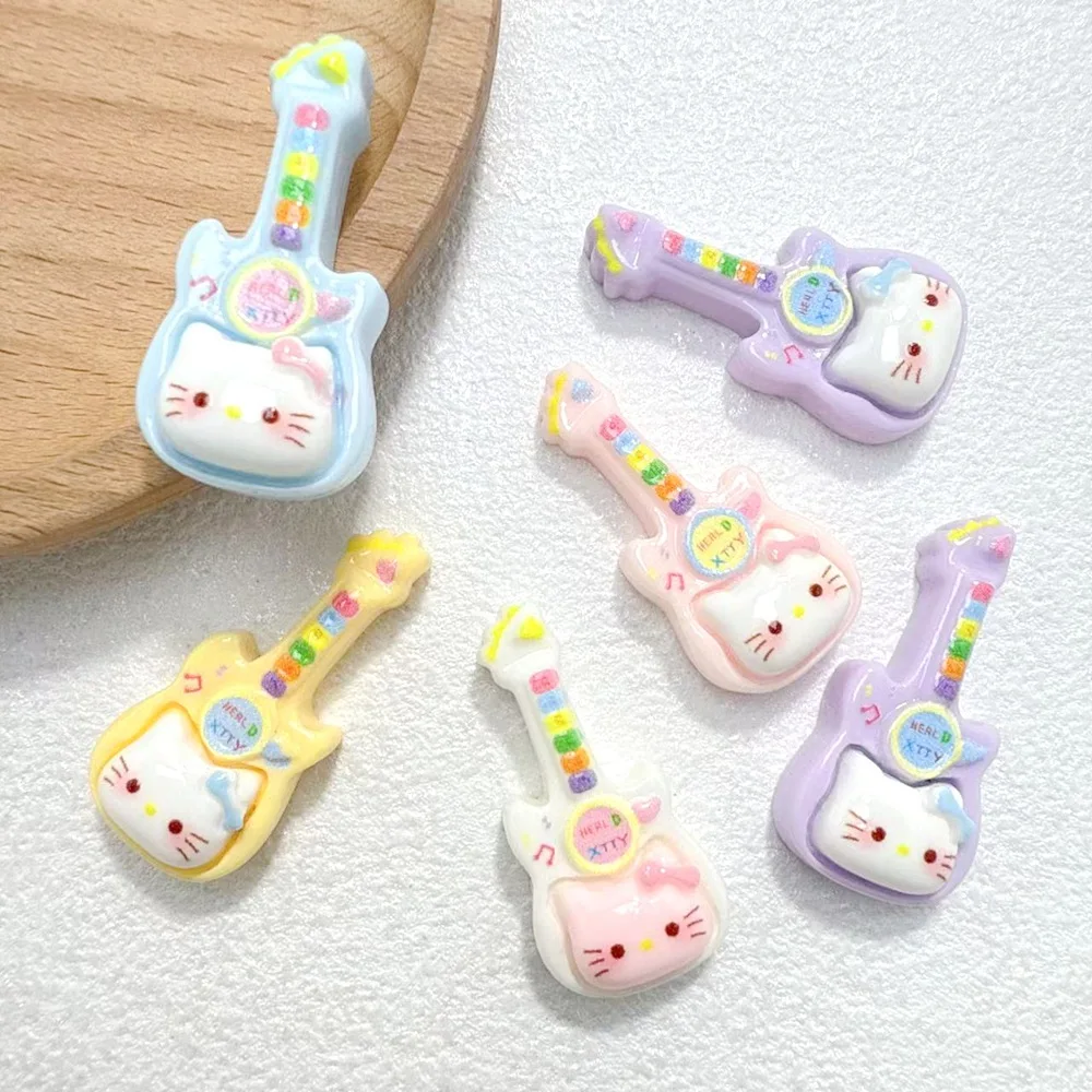 

100pcs Kawaii Flatback Resin Cartoon Hello Kitty Guitar DIY Scrapbook Refrigerator Phone Case Craft Decoration Accessories