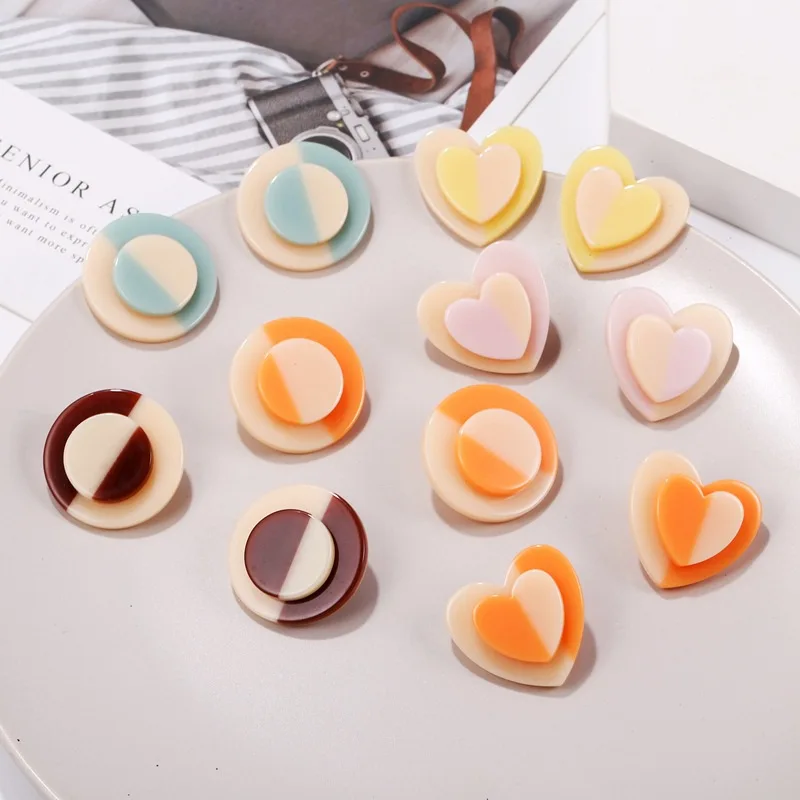 Acrylic contrasting stud earrings 2026 new women's fashion simple temperament round heart-shaped wholesale