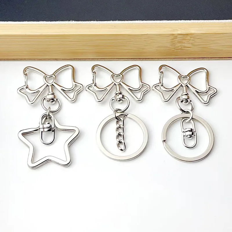 6-12 Stück Bogen Schlüsselanhänger Figur Acht Schnalle Stern Schlüsselanhänger Auswurfsschnalle DIY Spielzeug Schmuck Anhänger Link Herstellung Großhandel – Detail 10