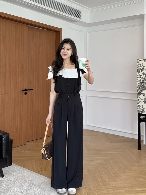 

Женский костюм-двойка: брюки с высокой талией и широкими штанинами, прямые брюки, модный крой, асимметричный подол и брюки.