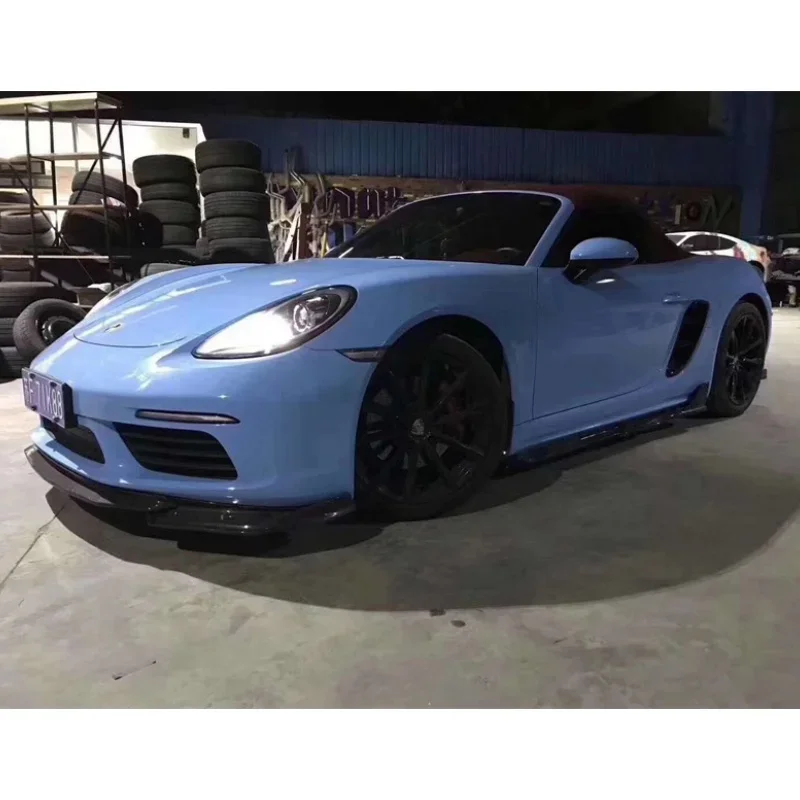 

Suitable for 16-20 Porsche 718 Boxster modified body kit, three-stage carbon fiber front bumper lip, rear diffuser side skirt