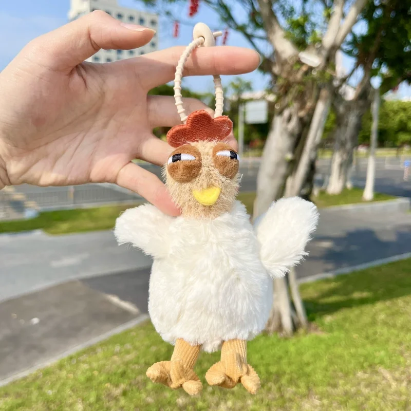 Peluche pulcino che fa l'uovo brutto e carino astratto regalo creativo ciondolo in peluche portachiavi con ciondolo zaino bambola che fa l'uovo