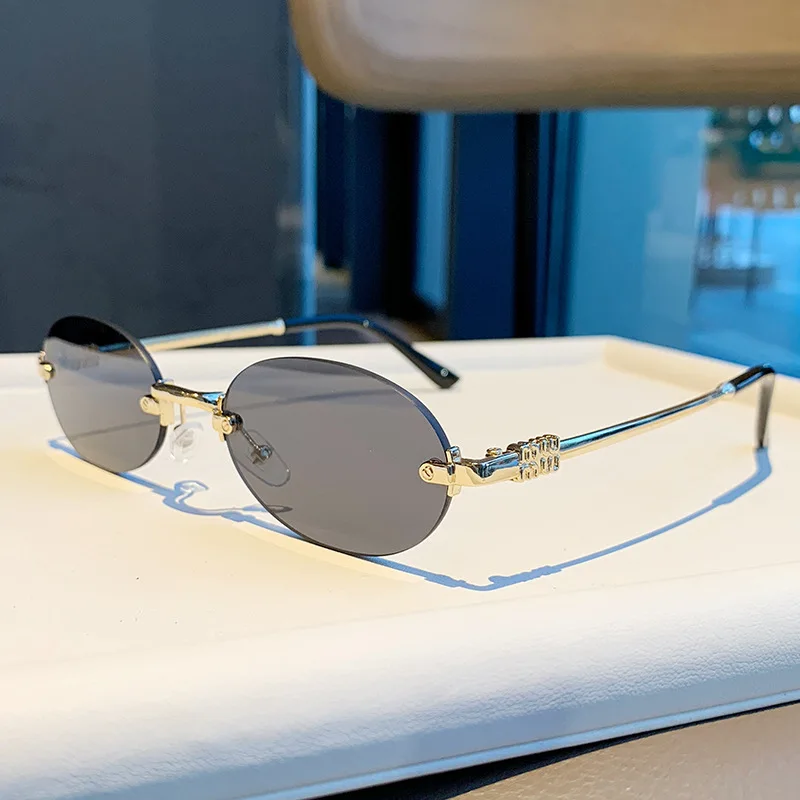 Light Luxury Rimless Oval Personalized Sunglasses, High-End Fashion Casual Sunglasses, Suitable For Outdoor Vacation Sunglasses view 4