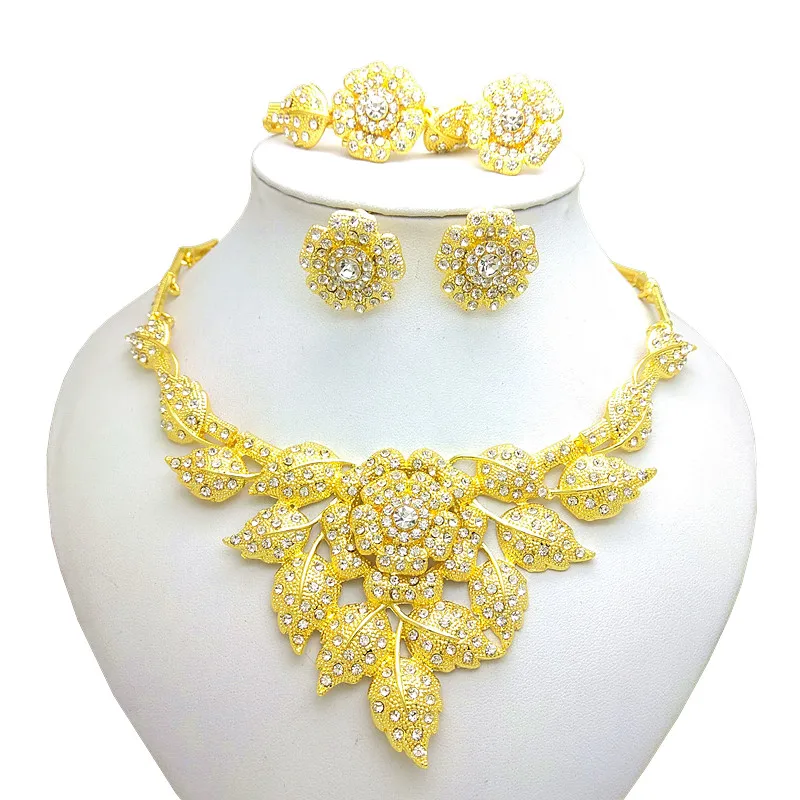 

Elegant Gold Jewelry Set with Gemstones - Necklace, Earrings, Bracelet, and Ring - Sophisticated Luxury for Special Occasions