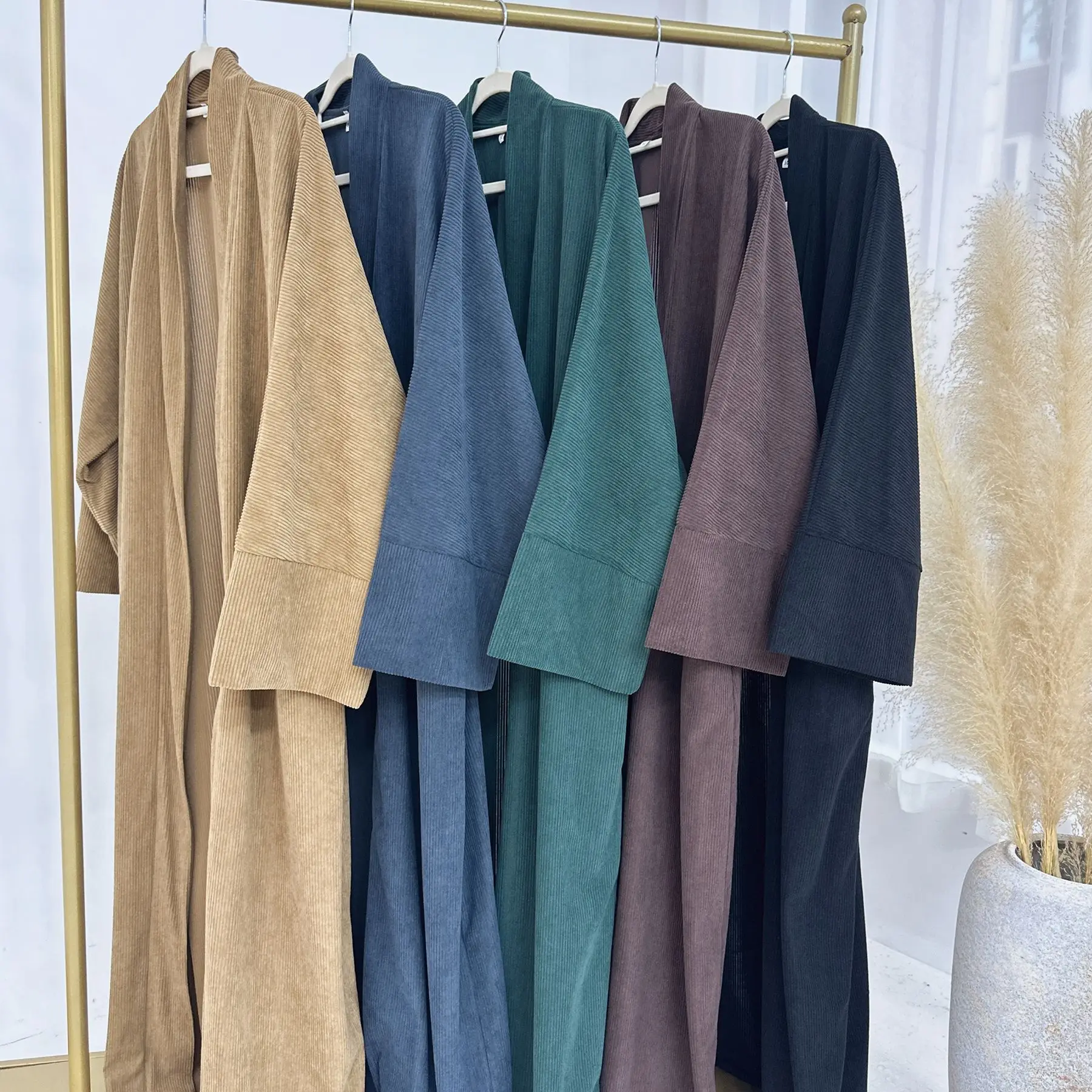 UNI Warm Winter Abayas Muslim Women Corduroy Abaya 2024 New Modest Dress Thicked Solid Color Long Robe Female Islam Clothing