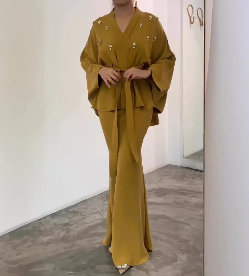 

Комплект из двух предметов, женский наряд, весна 2025 года, однотонный топ на шнуровке с v-образным вырезом и длинными рукавами, элегантный комплект с длинной юбкой с запахом на бедрах «рыбий хвост»