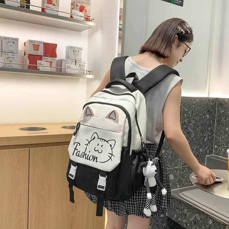 新しい女性用大容量ナイロンバックパックシンプルな韓国スタイルのスクールバッグ小中学生デュアルショルダーバッグ