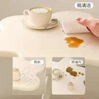 A few cream windblown hair and a few small coffee tables in the living room, a small dining table in the home, a small apartment 3
