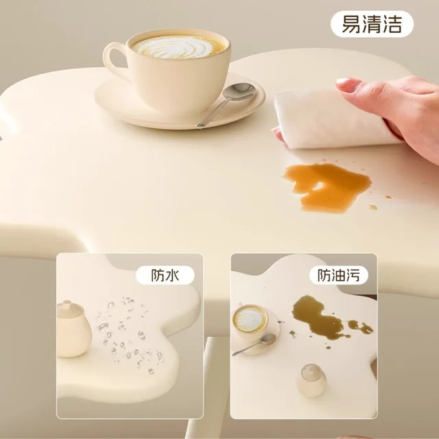 A few cream windblown hair and a few small coffee tables in the living room, a small dining table in the home, a small apartment 3