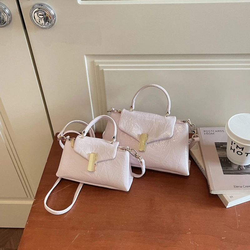 Women Bag 2026 New Handbag Solid Color Crossbody Pack Trend Simple Niche Design Versatile Casual Commuter Portable Messenger Bag