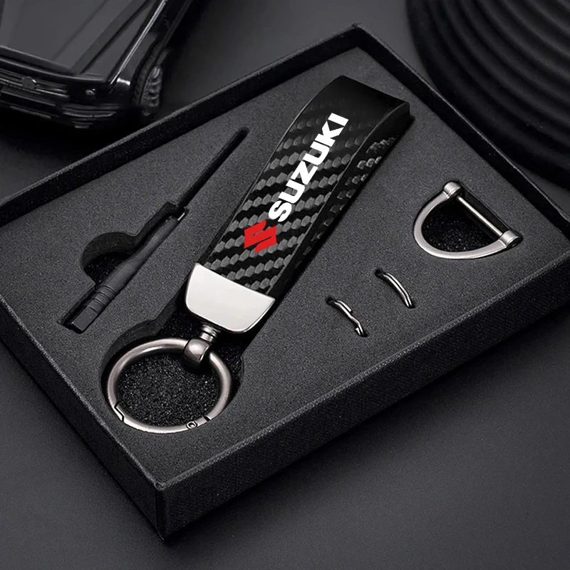 Llavero de fibra de carbono para coche, accesorios de aleación de zinc para Suzuki Jimny Samurai Vitara Swift Baleno Ignis Alto Splash Kaiser