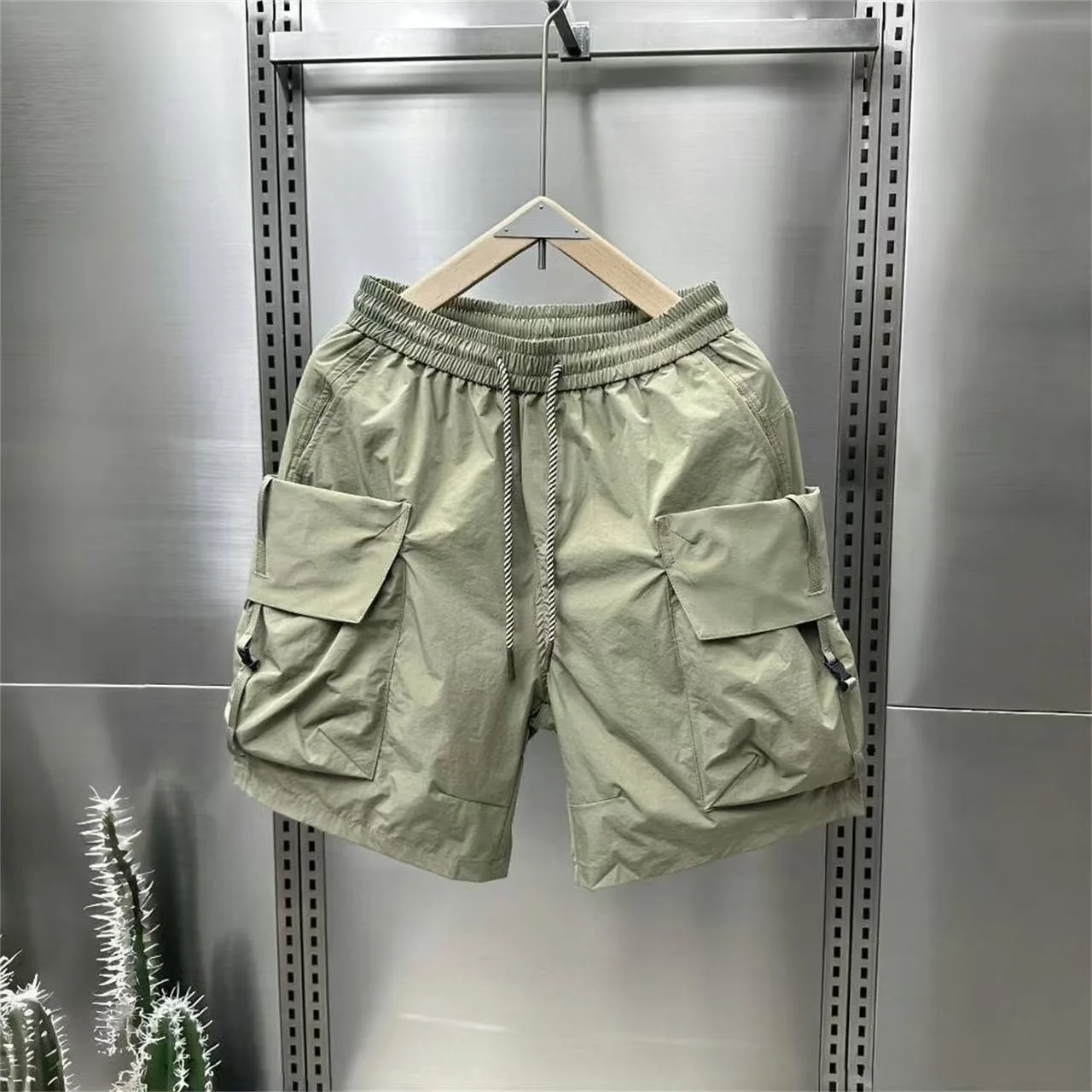 ชายหาดฮาวายแห้งเร็วกางเกงขาสั้นลายพรางกางเกงขาสั้นฤดูร้อนสบายๆอินเทรนด์และแฟชั่นเสื้อผ้าผู้ชายกางเกงกีฬา 2025 ใหม่