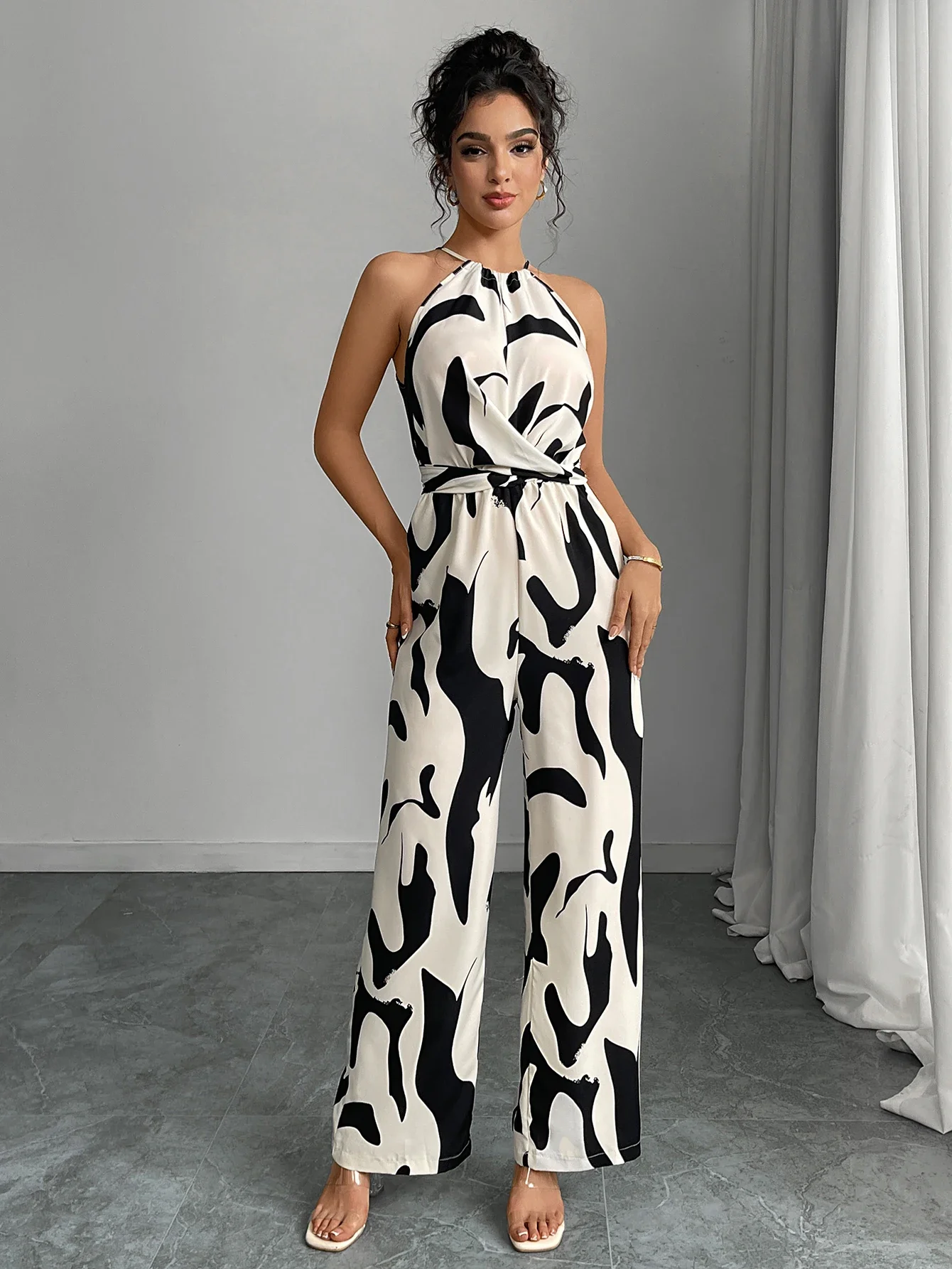 

Zebra striped camisole jumpsuit, spring and summer European and American style lace up wide leg pants, women's clothing