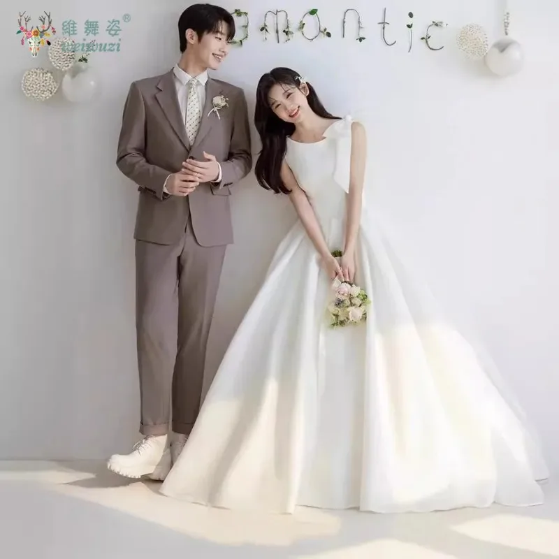 2025 Koreaanse stijl bruidsjurk met ronde hals, eenvoudige en één schouder strikdecoratie trouwjurk paar fotokleding