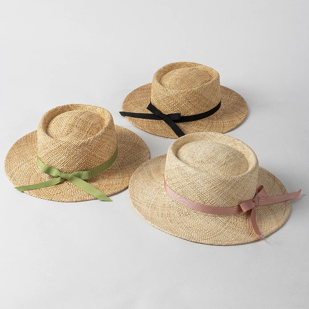 

Children's spring and summer fashion casual bow tie string wide eaves ring top treasure straw hat shopping sun block straw hat