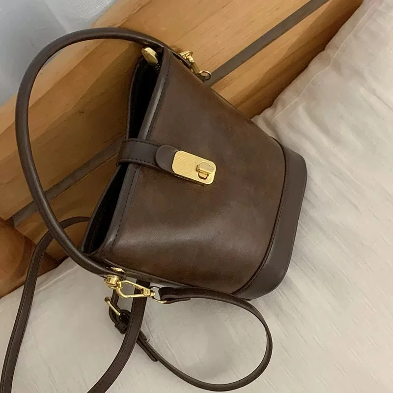 2024 Women's Melad Handbag New Fashionable Retro Bucket Bag Multi functional High end Crossbody Bag Buckle+Zipper Women's Bag