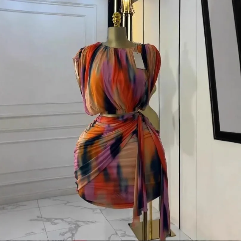 

Комплект женский с принтом тай-дай: топ с коротким рукавом и сборками, мини-юбка с эффектом многослойности, 2 предмета, коллекция 2026