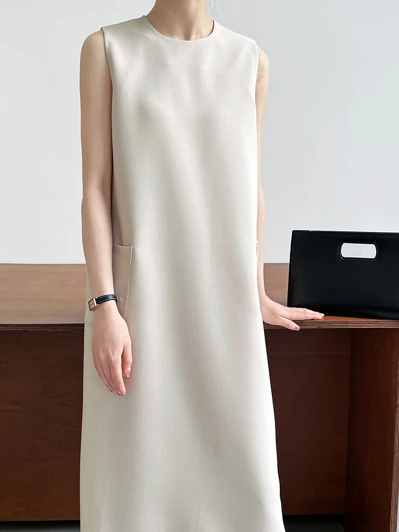 2023 Summer New Solid Color Loose Sleeveless Pocket Commuter Mid length Dress Women's Round Neck Straight Sleeve Fashion Dress