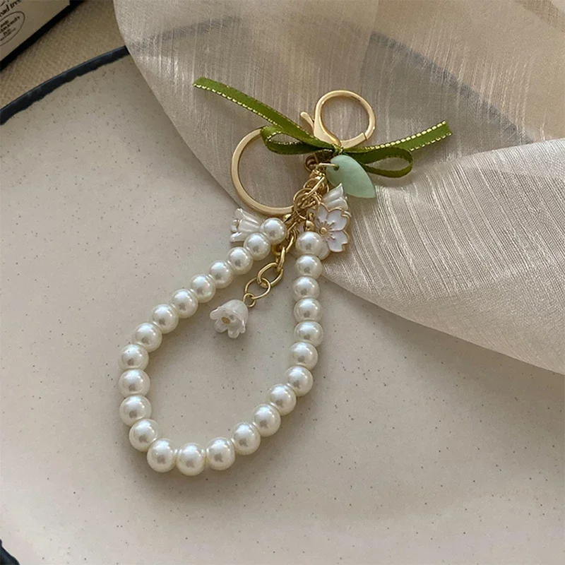 Fresh And Elegant Bell Orchid Keychain Women Green Sweet Imitation Pearl Leatherresin Alloy Keychain Jewelry Accessory Gifts K-