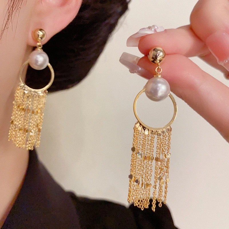 

Earrings woman golden and silver tassels 2025 trend accesories