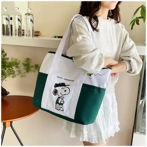 MINISO Ny tecknad söt Snoopy stor kapacitet tryckt casual canvasväska fräsch pendlarväska student enaxlad handväska 12 best sales Snoopy Zara - №7