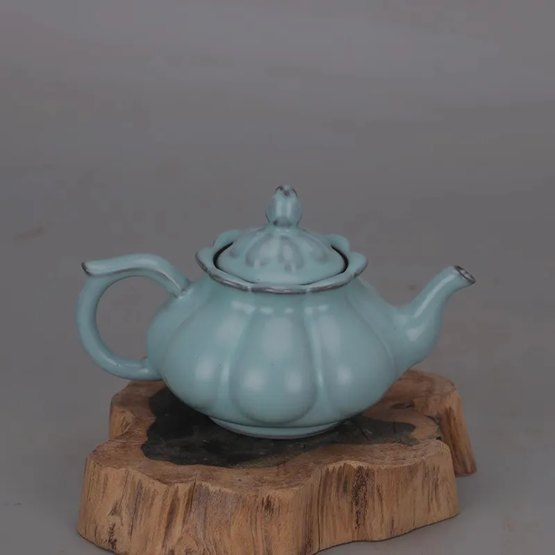

Antique home decoration: Blue-glazed pumpkin-shaped porcelain pot from Ru Kiln in the Song Dynasty